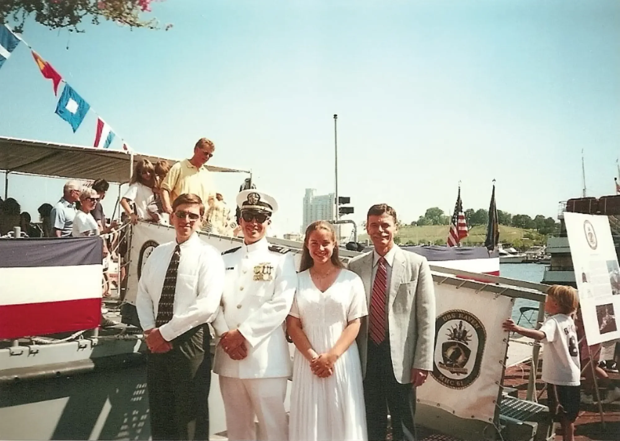 LT Kylan Jones-Huffman ’94, USNR, with his family at the christening ceremony for Raven at the Inner Harbor in Baltimore, MD, in September 1998.